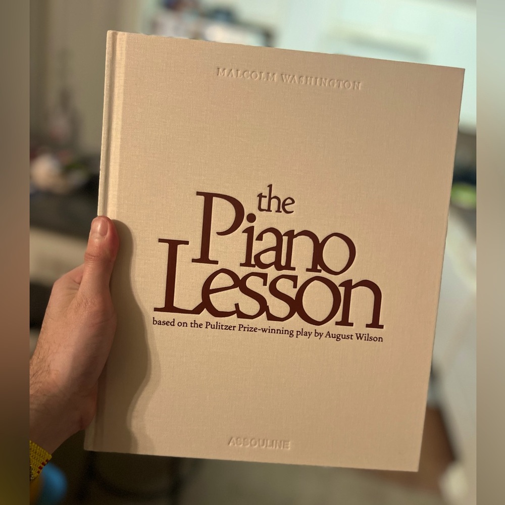 Hardcover book on the production of Netflix’s “The Piano Lesson.”